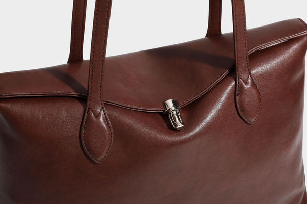 Large leather-look tote shoulder bag with slim double straps and silver-tone turn-lock closure, detail view 32