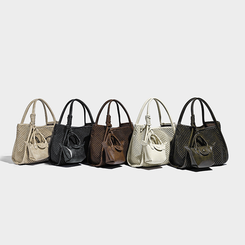 Große, strukturierte Tote-Bag in geflochtener Seiloptik mit glatten Besätzen in Lederoptik, zwei geknoteten Tragegriffen und abnehmbarer Mini-Tasche vorn