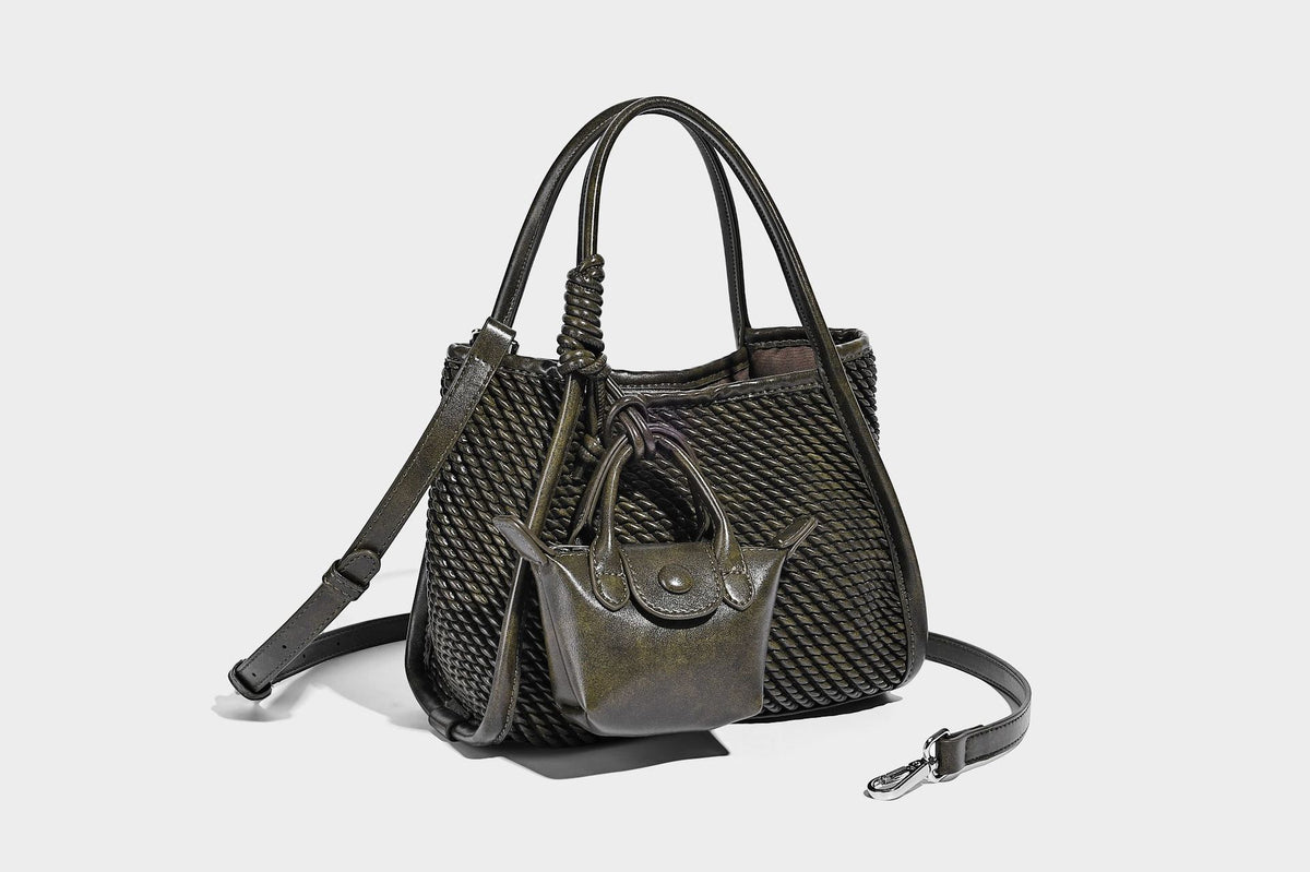 Large structured woven rope-texture tote bag with smooth leather-look trim, knotted dual top handles, detachable mini front