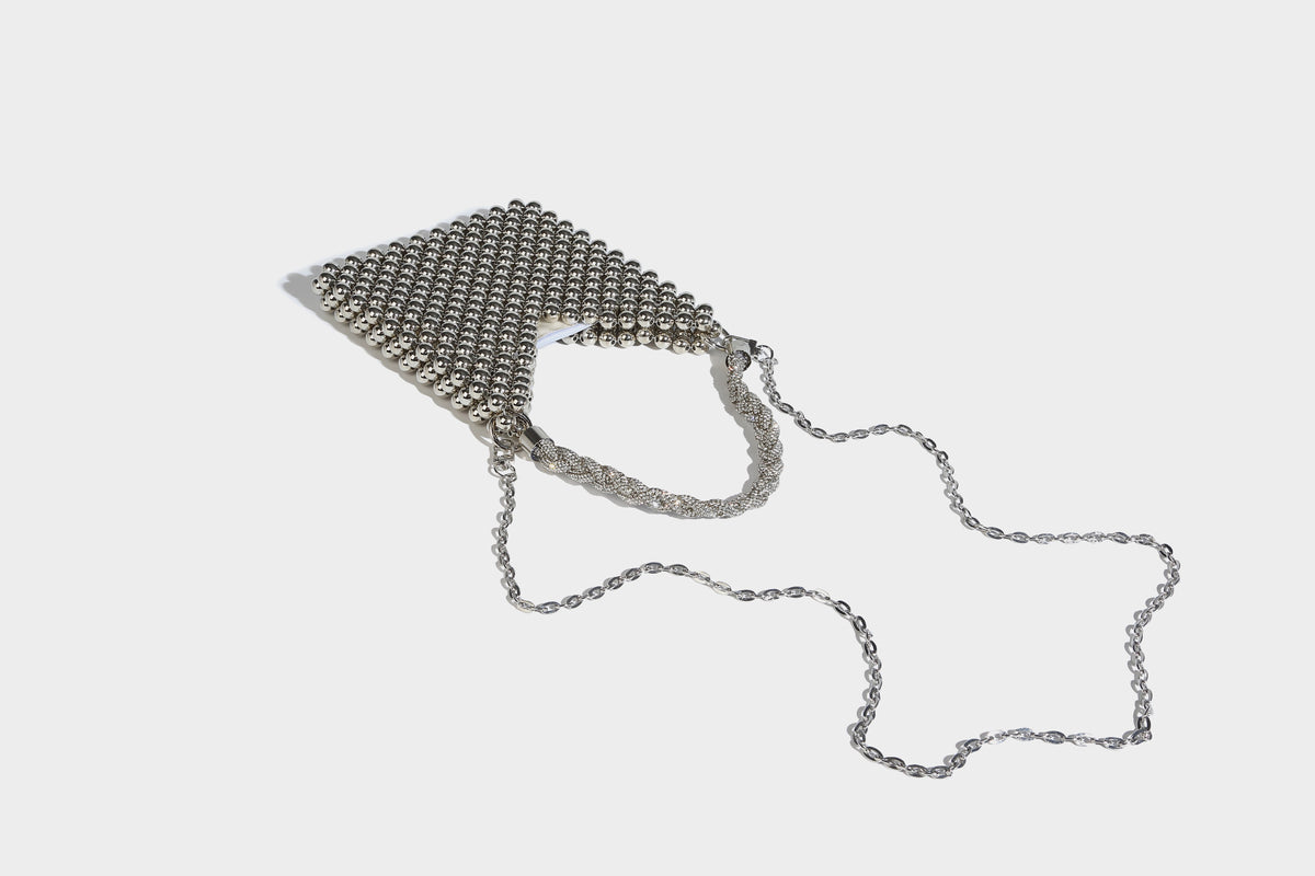 Small silver metallic beaded mini bag with braided rhinestone top handle and detachable chain crossbody strap, detail view 17