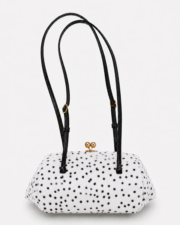 Spotted faux-fur barrel shoulder bag with gold kiss-lock clasp and black adjustable leather-look straps, detail view 7