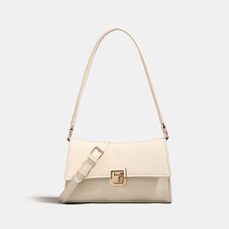 Compact structured flap shoulder bag with gold-tone turn-lock closure and adjustable strap, detail view 6