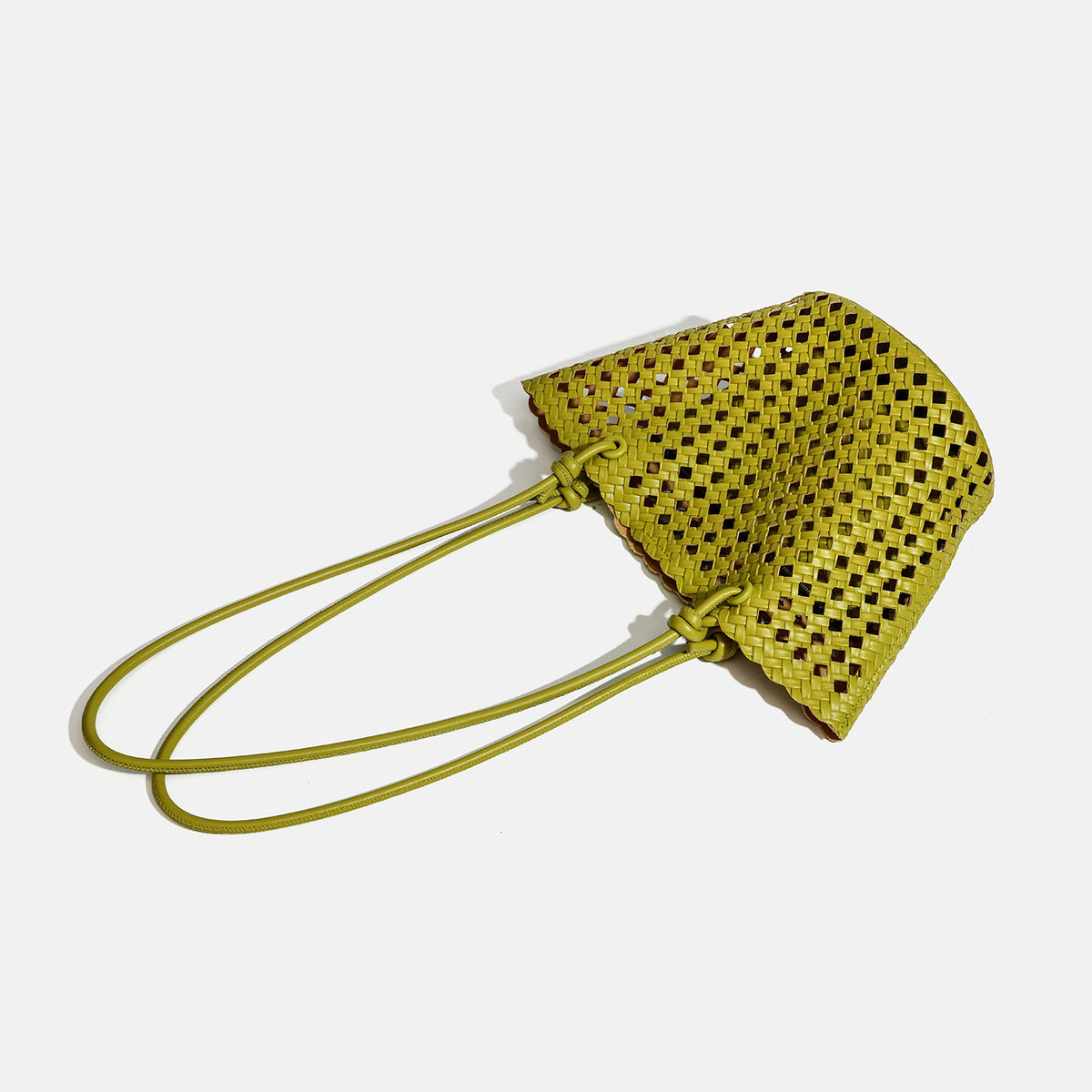 Open-weave lattice bucket tote bag with long knotted cord handles and tapered silhouette, detail view 4