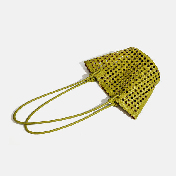 Open-weave lattice bucket tote bag with long knotted cord handles and tapered silhouette, detail view 4