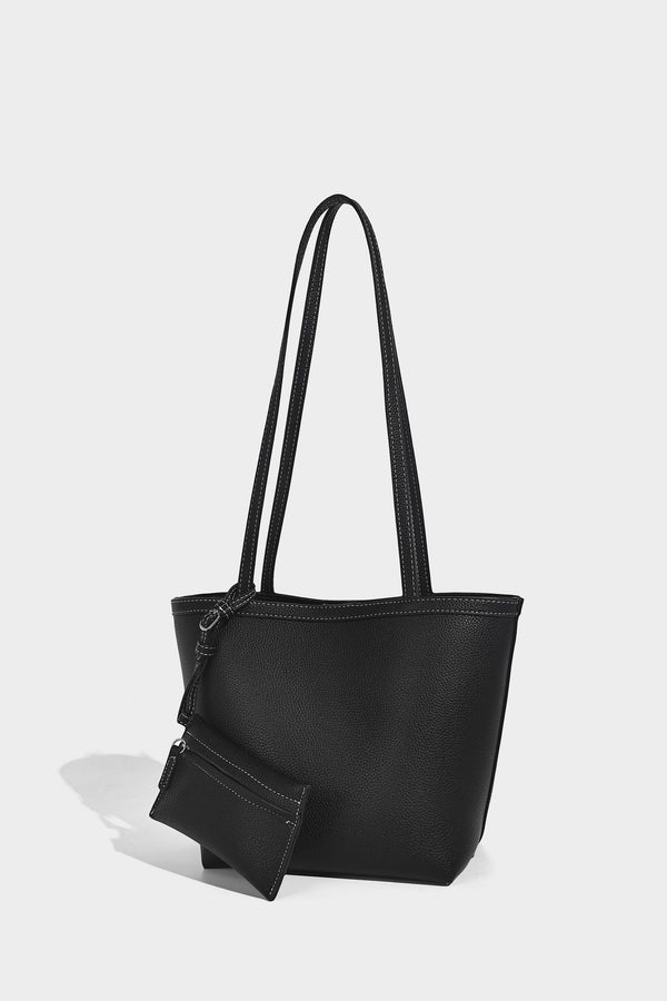 Structured pebbled leather-look tote bag in taupe with long shoulder strap, detachable zip pouch, and pink tulip flower