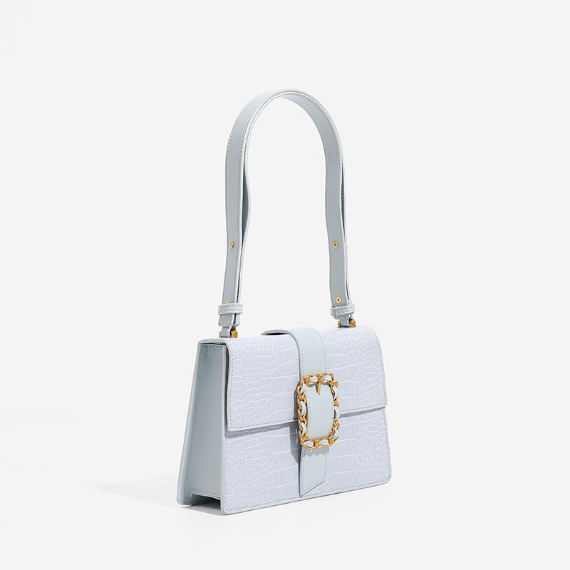 Structured crocodile-embossed flap shoulder bag with gold chain buckle hardware and adjustable strap, detail view 3