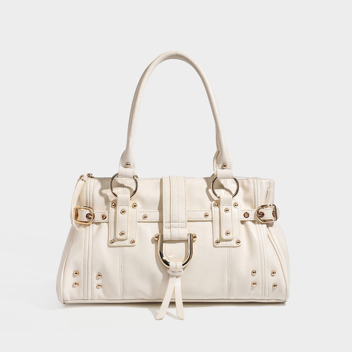 Dark brown glossy leather-look structured satchel tote with gold-tone studs, buckle straps, dual top handles, and detachable