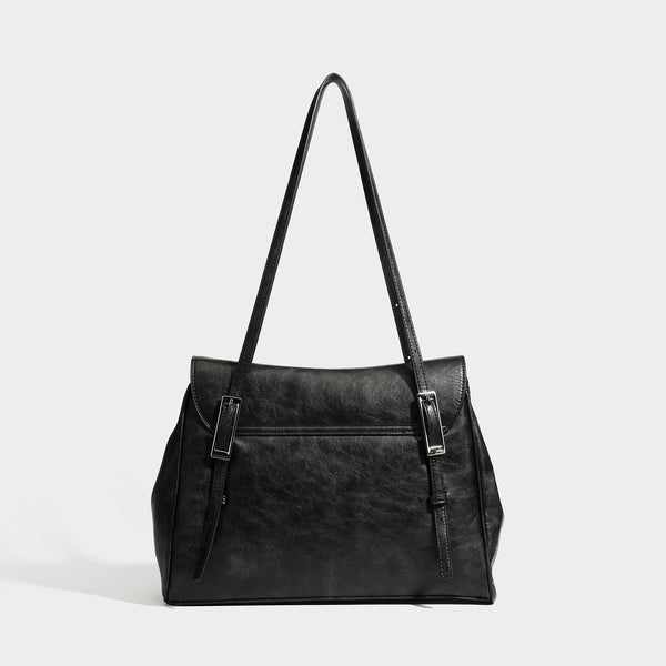 Structured flap-top shoulder tote bag in distressed leather-look finish with silver-tone buckle hardware and double shoulder
