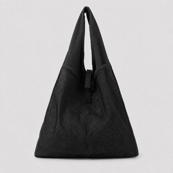 Oversized triangular mesh tote bag with matte olive-khaki fabric straps and trim, dark open-weave mesh body, matte black