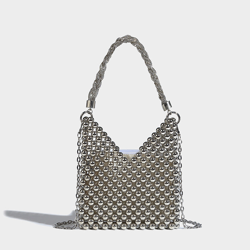 Small silver metallic beaded mini bag with braided rhinestone top handle and detachable chain crossbody strap, detail view 2