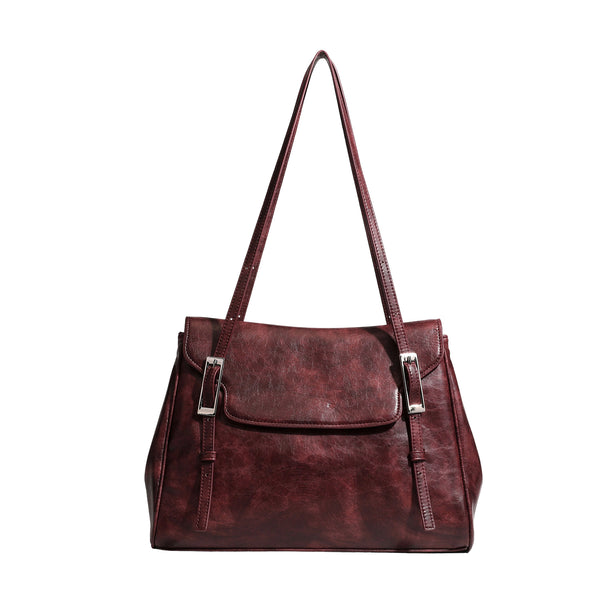 Large structured shoulder tote bag in wine red textured leather-look finish with front flap closure and silver-tone buckle
