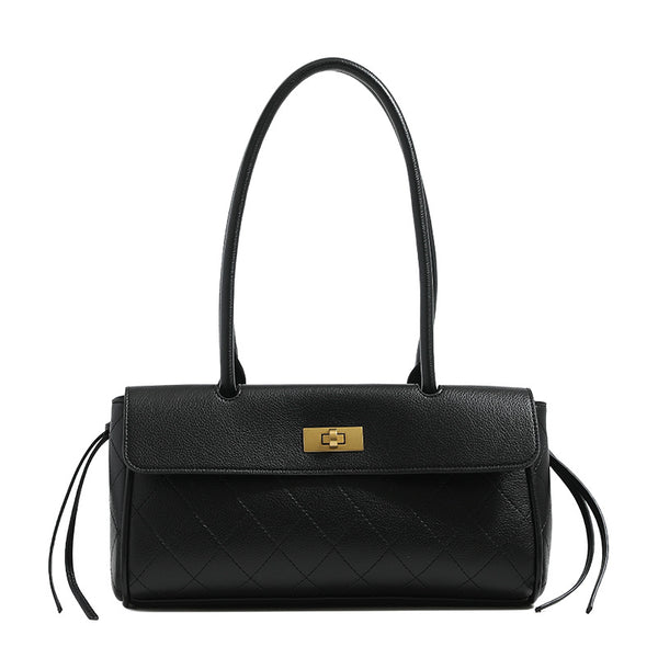 Structured quilted diamond-stitch baguette handbag with gold-tone turn-lock closure and dual top handles, detail view 5