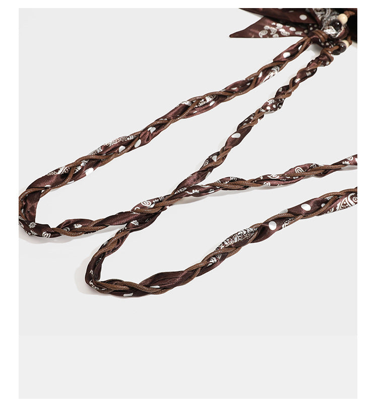 Brown suede-finish tote bag with paisley embroidery and braided fabric-ribbon shoulder strap, detail view 25