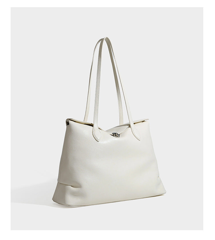 Large leather-look tote shoulder bag with slim double straps and silver-tone turn-lock closure, detail view 15