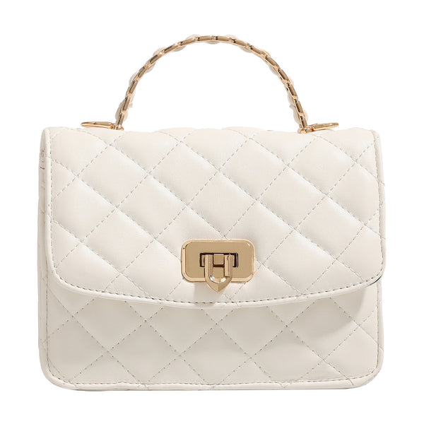 Small structured quilted flap crossbody bag with gold-tone turn-lock closure and chain strap, detail view 5