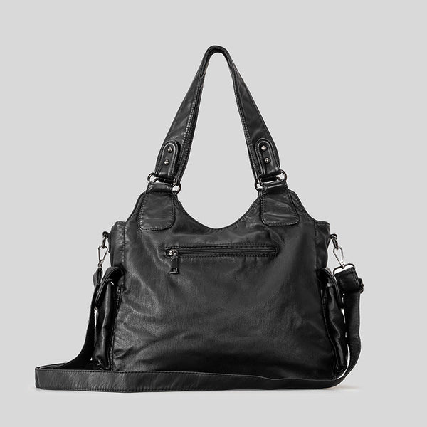 Große schwarze Hobo-Schultertasche in Used-Lederoptik mit mehreren Reißverschlussfächern auf der Vorderseite, zwei Tragegriffen und abnehmbarem
