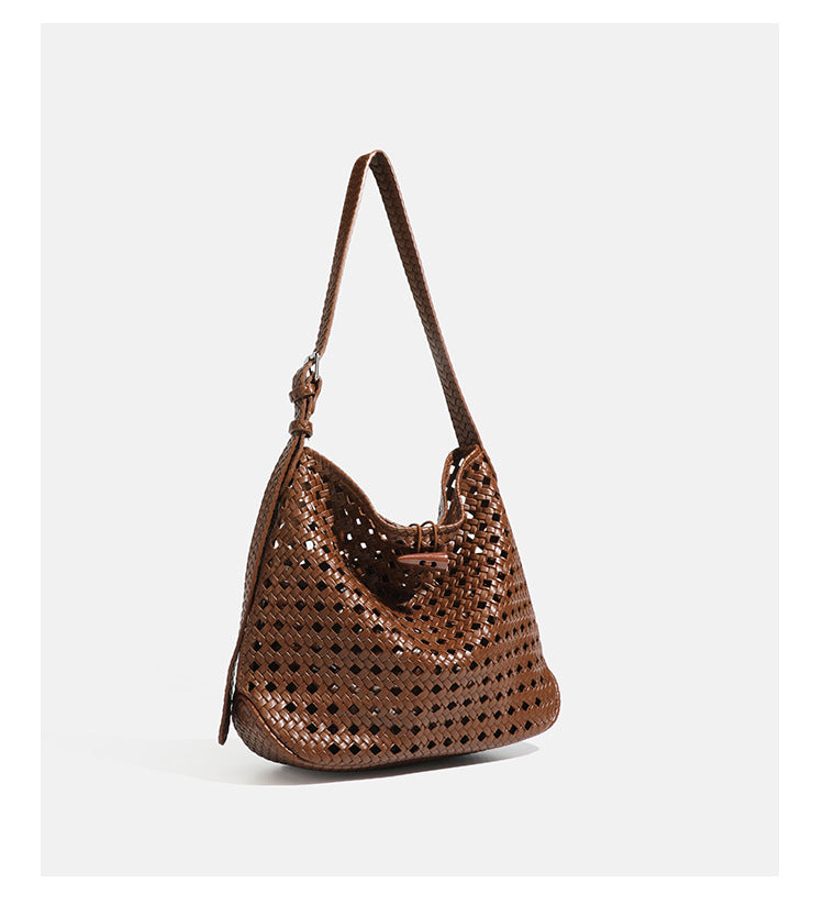 Brown open-lattice woven leather-look hobo shoulder bag with braided strap and matching zip pouch, detail view 15