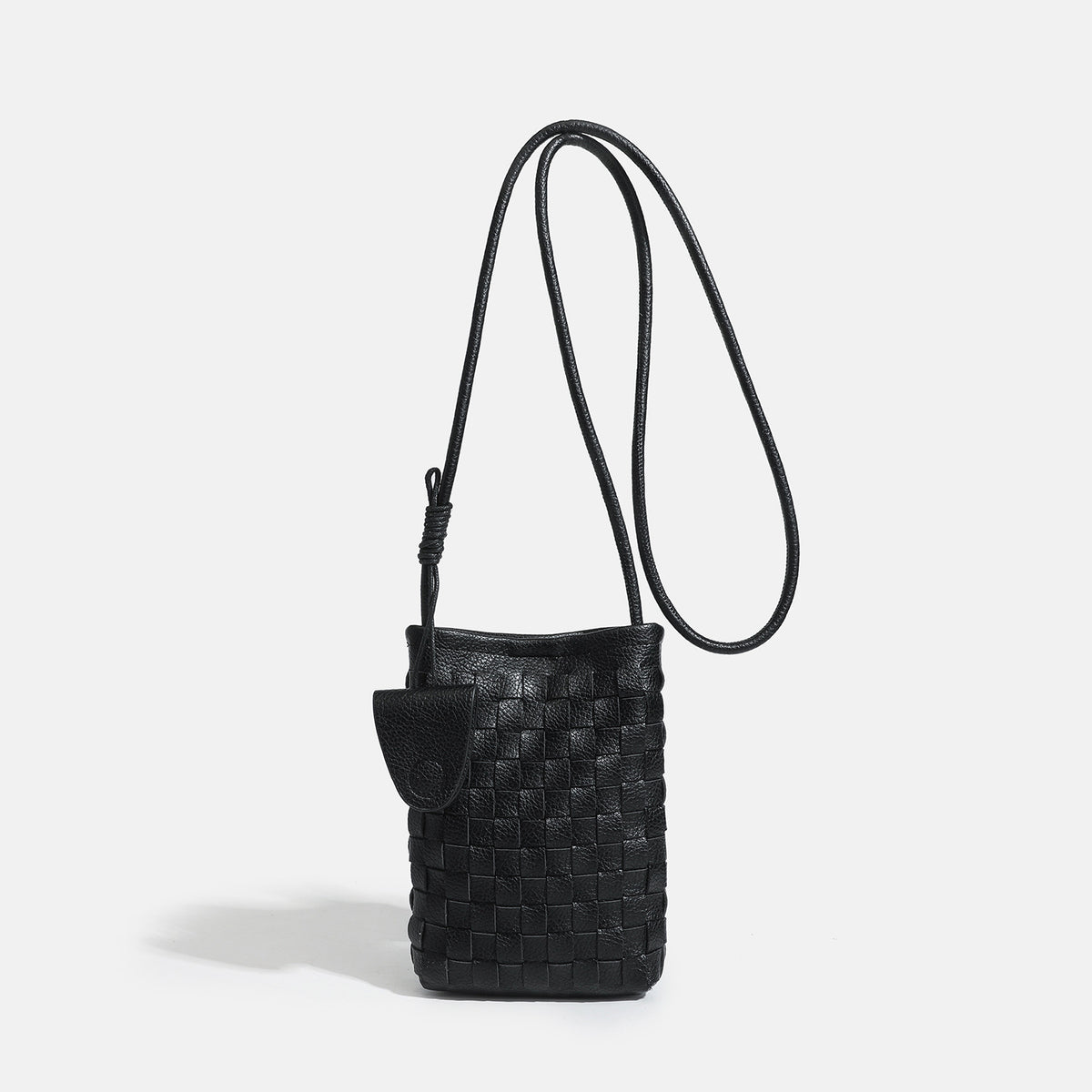 Mini woven square-pattern crossbody phone bag with long cord strap and front snap flap pocket in red textured leather-look