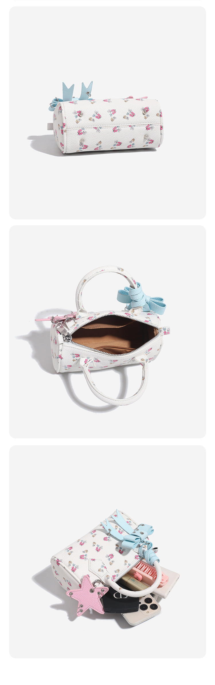 Mini-Boston-Tasche in Weiß mit genarbter Oberfläche, Blumen- oder Kirschprint, pastellblauem Schleifenanhänger, rosafarbenem Sternanhänger und zwei oberen