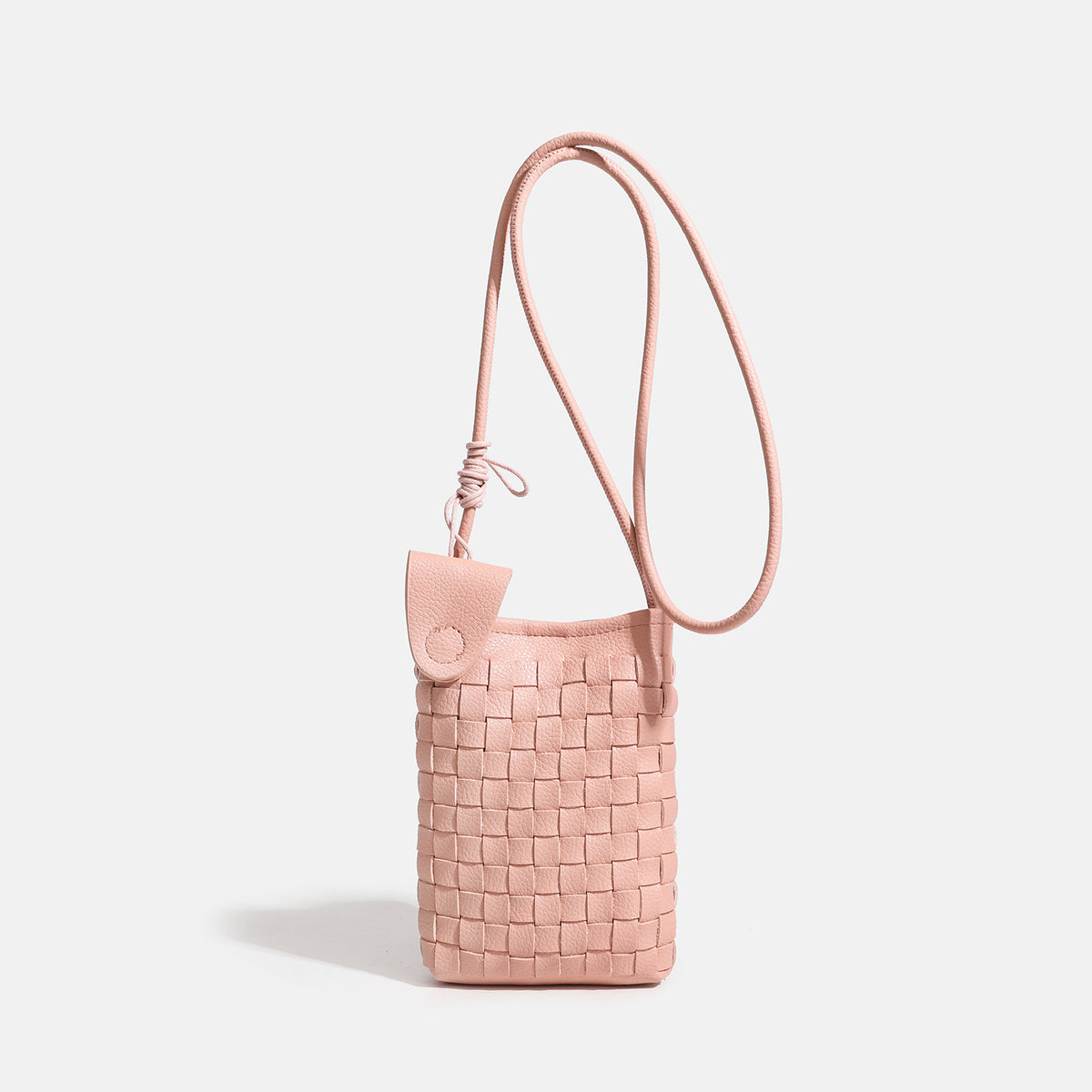 Mini woven square-pattern crossbody phone bag with long cord strap and front snap flap pocket in red textured leather-look