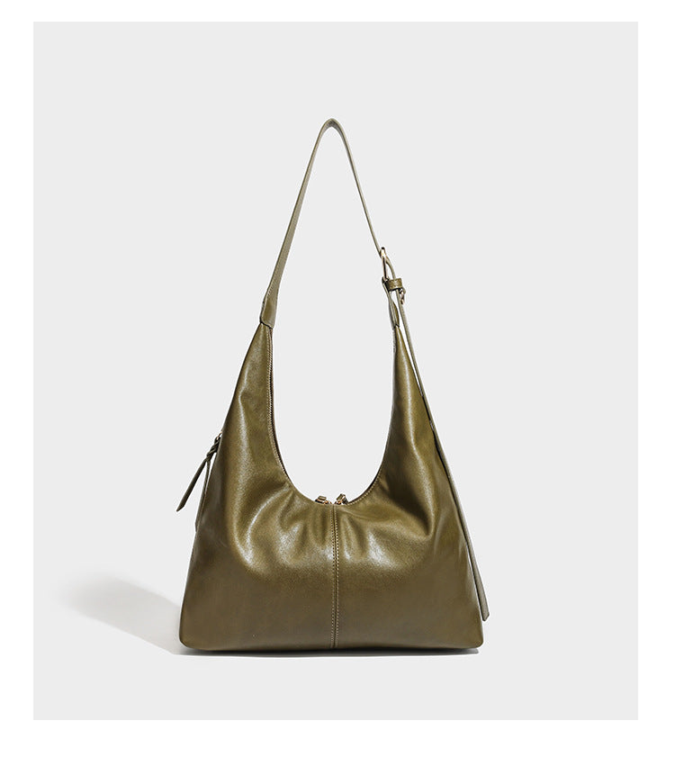 Lässig fallende Hobo-Schultertasche mit strukturierter Wildlederoptik, Reißverschluss oben, Quasten-Zippern und goldfarbenem, verstellbarem