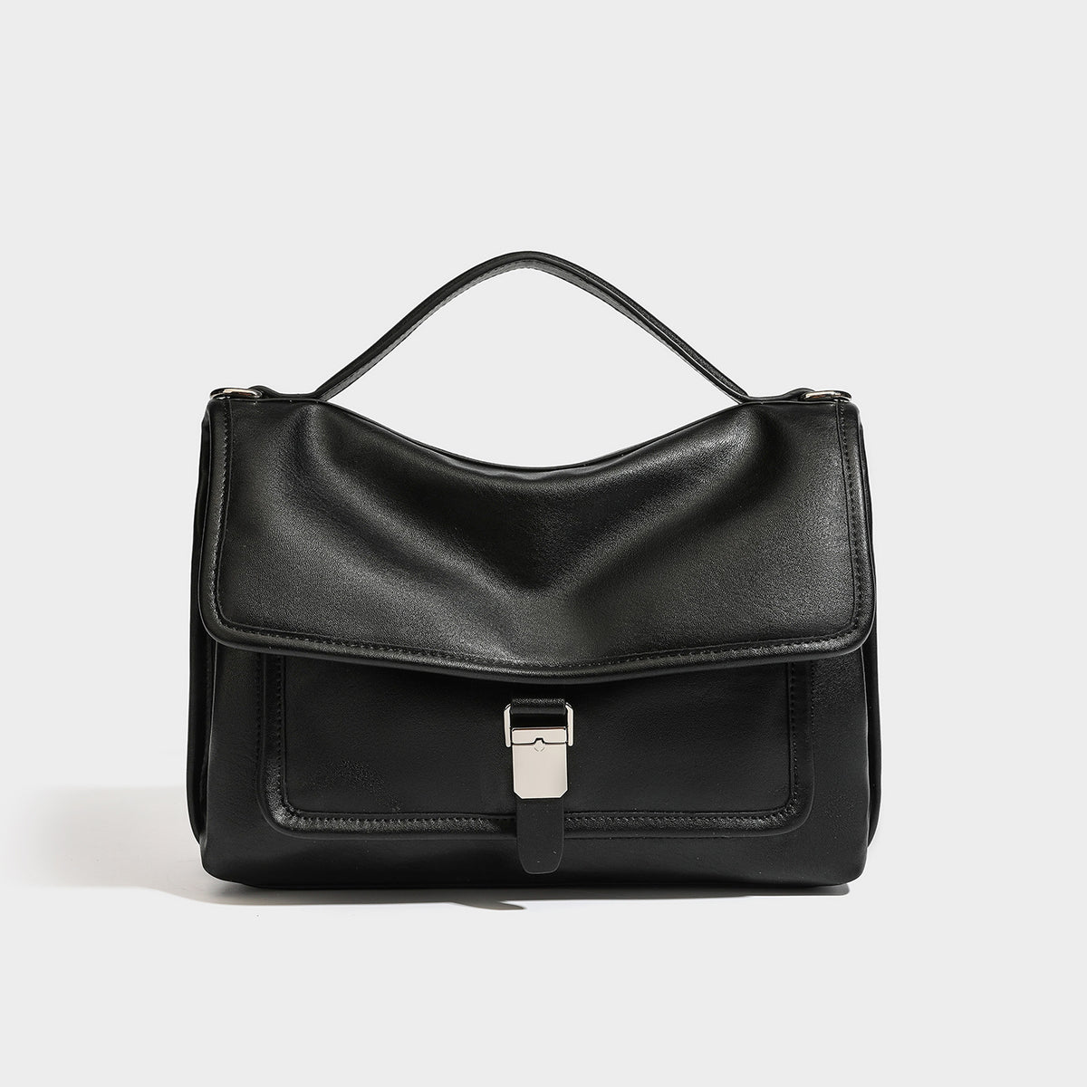 Structured rectangular flap satchel in espresso brown leather-look finish with silver-tone turn-lock buckle, top handle, and