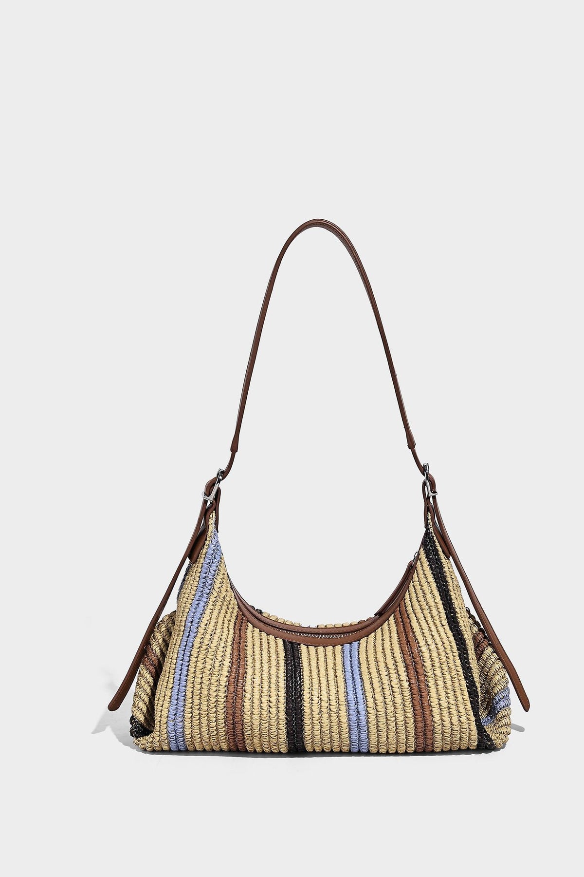 Slouchy woven straw hobo shoulder bag with beige, black, brown, and blue vertical stripes and brown leather-look trim, detail