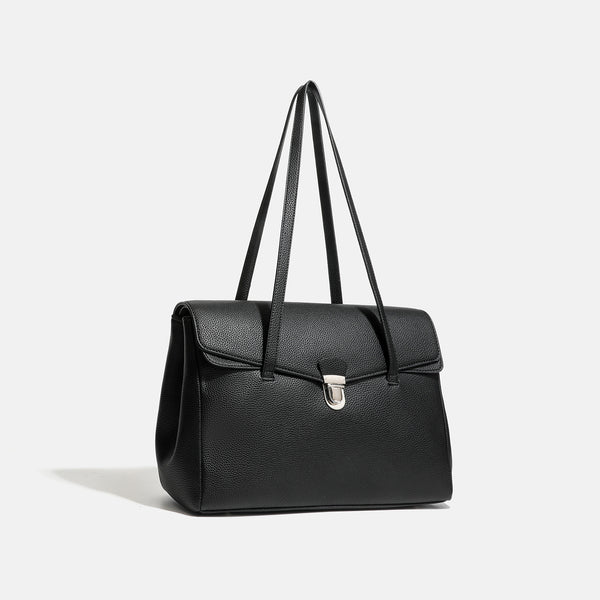 Structured black pebbled-finish flap tote bag with silver turn-lock clasp and long double shoulder straps, detail view 2