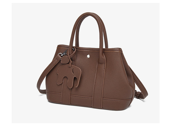 Structured pebbled leather-look top-handle tote bag with elephant charm and detachable shoulder strap, detail view 13