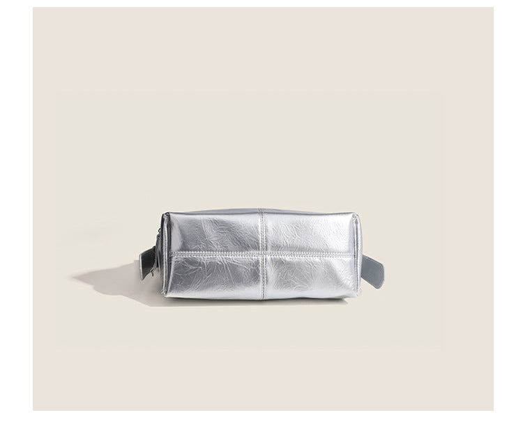 Glossy crinkled mini hobo shoulder bag with studded adjustable strap and silver-tone hardware, detail view 16