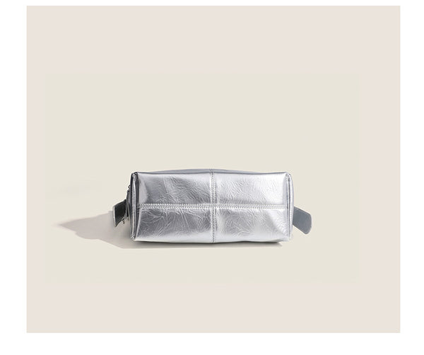 Glossy crinkled mini hobo shoulder bag with studded adjustable strap and silver-tone hardware, detail view 16