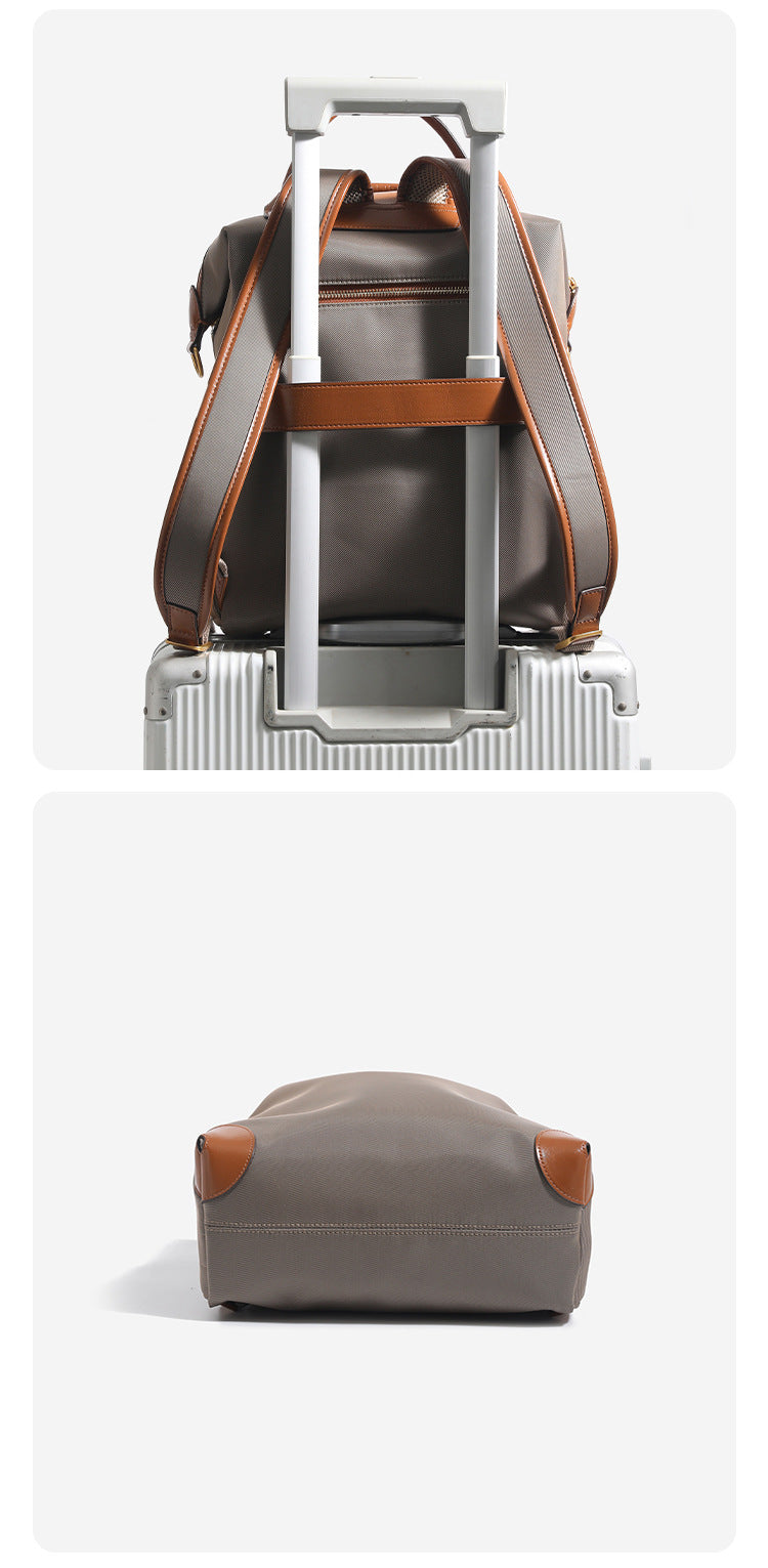 Large matte nylon backpack handbag with cognac leather-look trim, snap flap, and gold-tone hardware, detail view 16