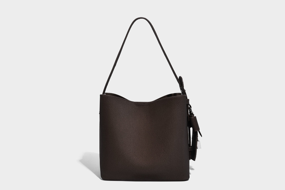 Pebbled leather-look bucket shoulder bag with zip inner pouch and adjustable crossbody strap, detail view 15