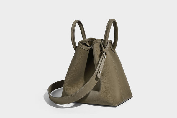 Small structured matte pebbled tote bag with twin top handles and removable zip pouch, detail view 33