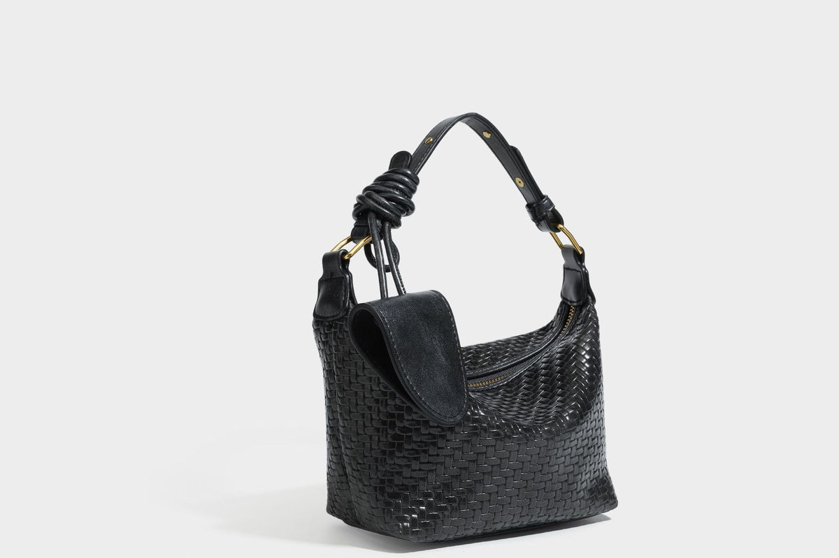Small glossy basket-weave hobo shoulder bag in brown with knotted top handle, flap accent pocket, and gold-tone hardware