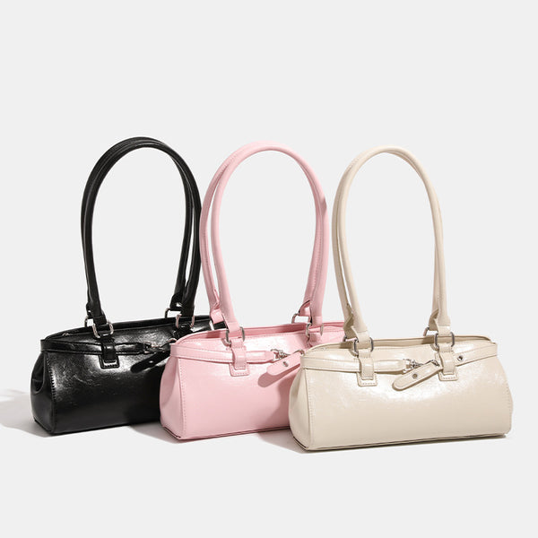 Glossy leather-look baguette shoulder bag with silver-tone hardware and buckle-strap detail, detail view 2