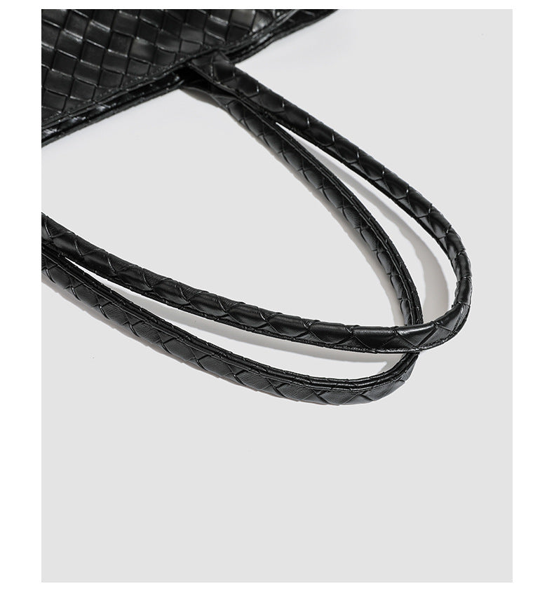 Large structured black woven diamond-pattern tote bag with braided double shoulder straps and glossy leather-look finish
