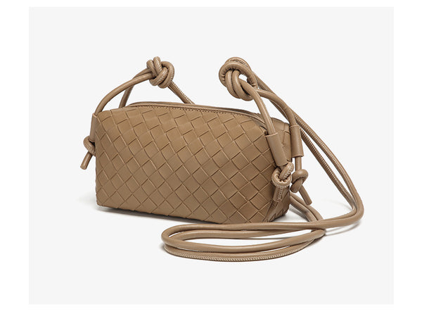 Small rectangular woven-texture mini crossbody bag with knotted rope strap and gold-tone zip closure, detail view 22