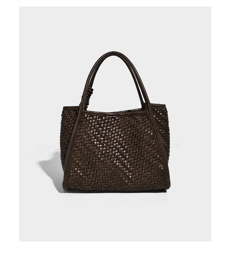 Woven texture open-top tote bag with smooth trim top handles and attached mini drawstring pouch in dark brown, detail view 11