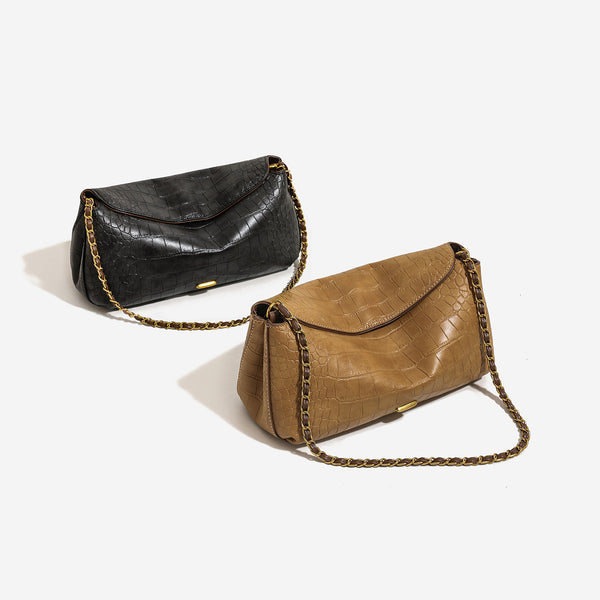 Croc-embossed pillow crossbody shoulder bag with gold-tone chain strap and flap closure, detail view 2
