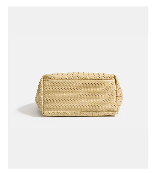 Woven leather-look tote bag in yellow with long shoulder straps, heart-shaped hanging charm, and removable inner zip pouch