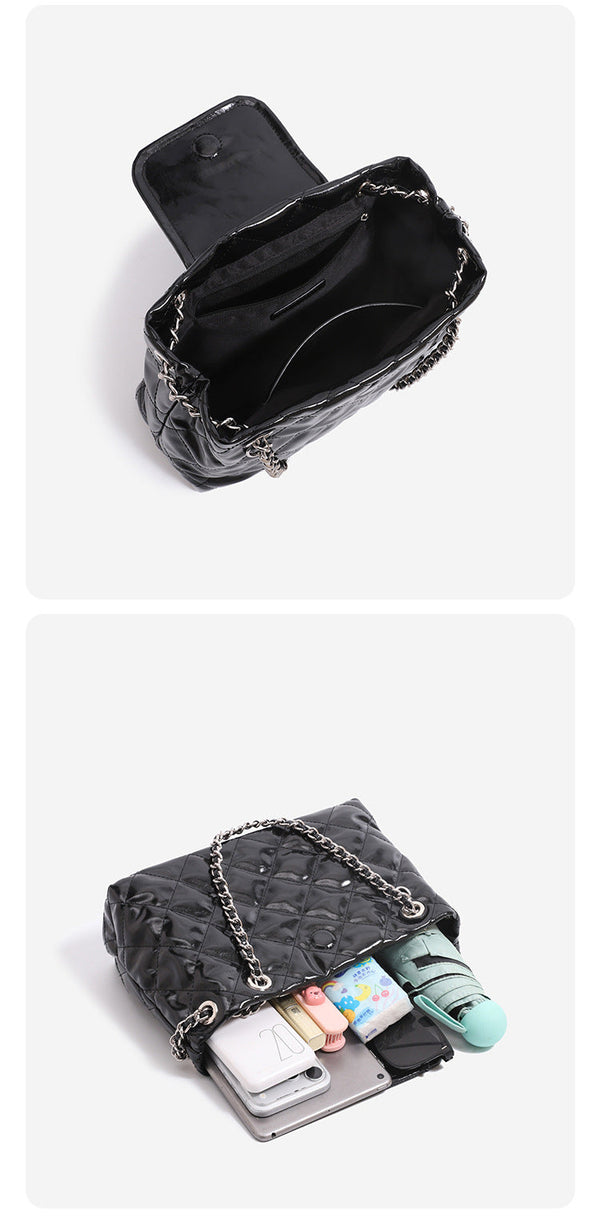 Structured diamond-quilted glossy black shoulder tote bag with interwoven silver chain strap and front flap snap pocket