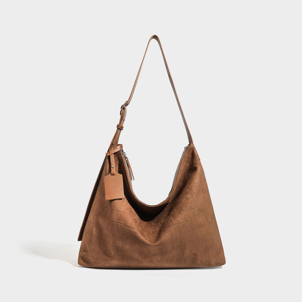 Slouchy croc-embossed matte hobo shoulder bag with adjustable strap and top zip closure, detail view 2