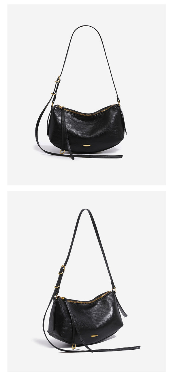 Compact soft rounded zip-top shoulder bag with gold-tone hardware and adjustable crossbody strap, detail view 10