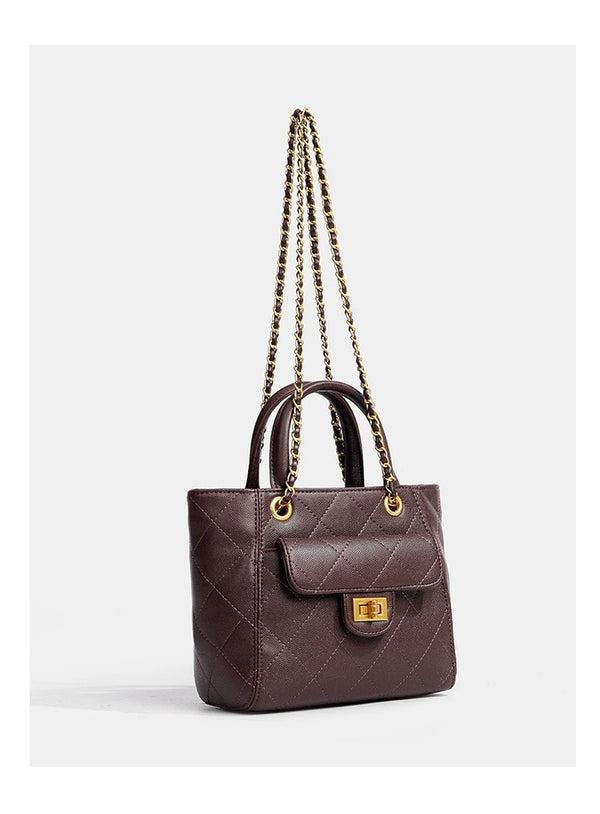 Diamond-quilted leather-look shoulder tote bag with gold-tone chain strap and dual top handles, detail view 13