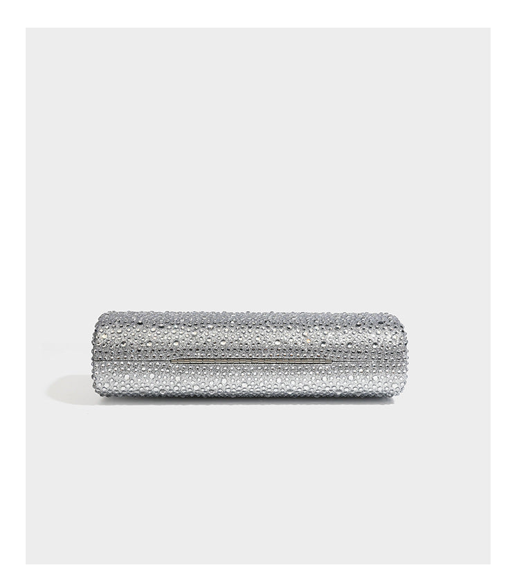Structured rectangular hard-case clutch bag covered in all-over rhinestone crystal embellishment with curved kiss-lock top