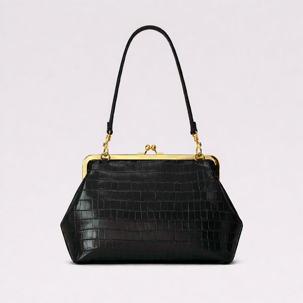 Trapezoid kiss-lock frame shoulder bag with gold-tone hardware and slim adjustable strap, detail view 11
