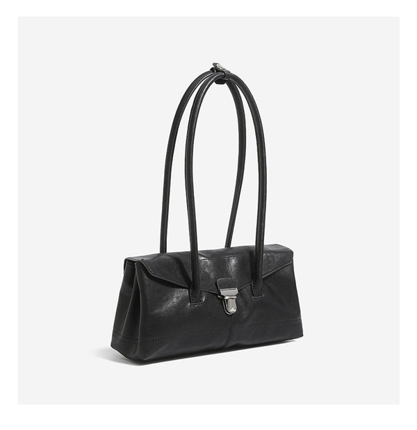 Compact structured rectangular flap shoulder bag with silver-tone turn-lock clasp and long rounded handles, detail view 9