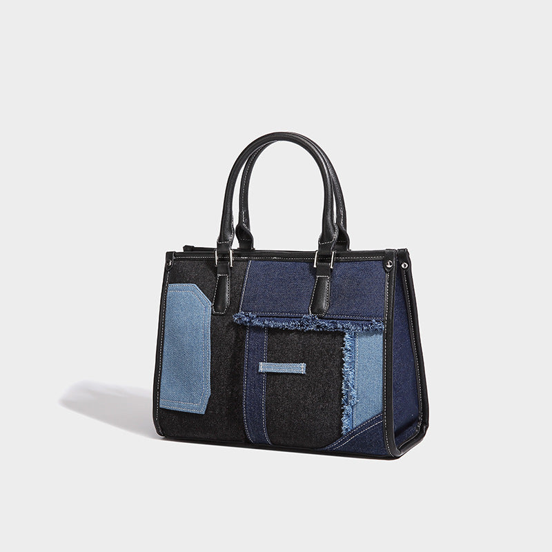 Structured patchwork denim tote bag with frayed panel seams, dual top handles, and silver-tone hardware, front view