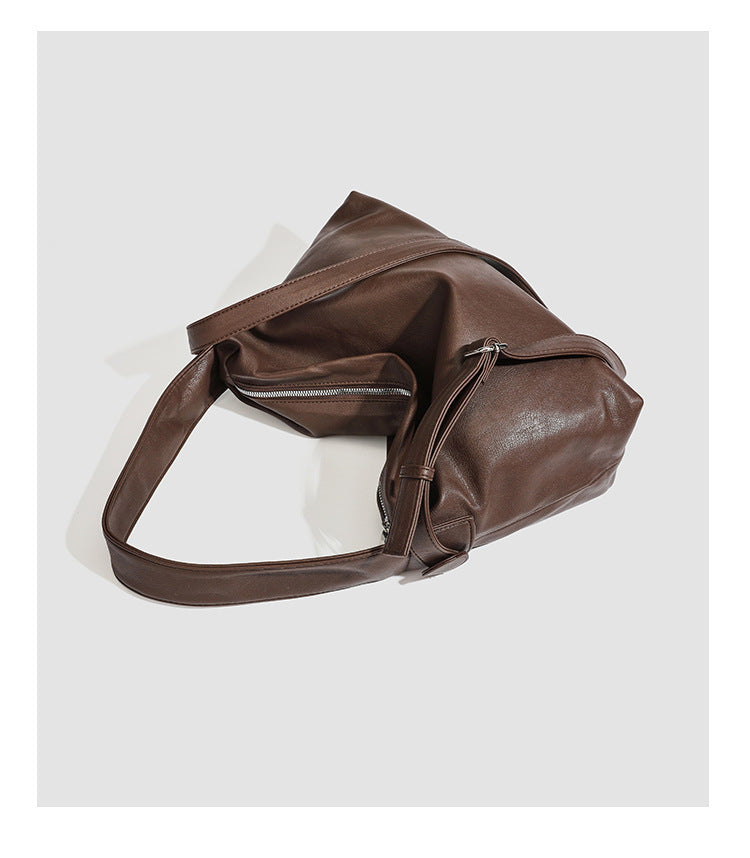 Slouchy leather-look hobo shoulder bag with top zipper and silver-tone hardware, detail view 20